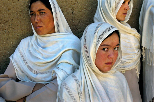 midwives in a courtyard